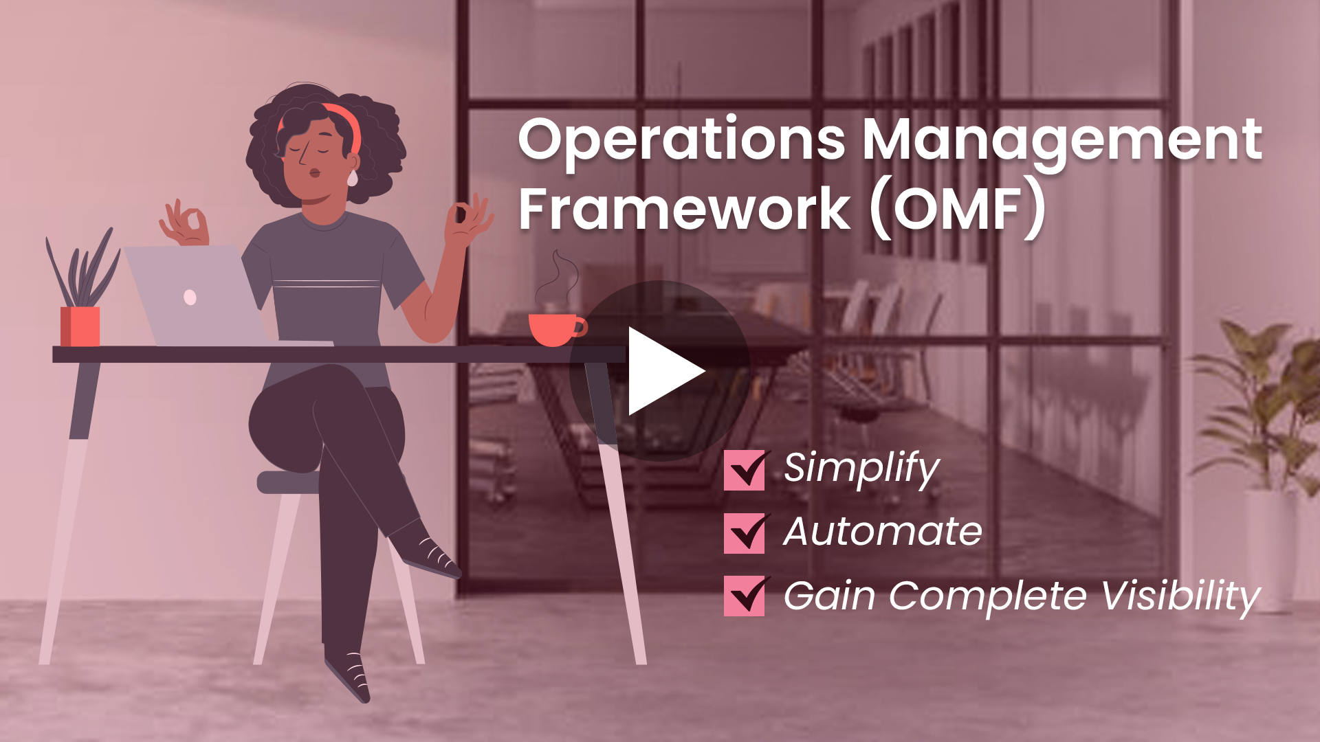 A group of people sitting around a table working on a laptop.